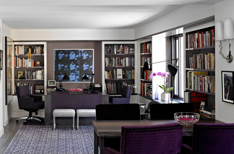 Contemporary home office in New York with grey walls and a built-in desk.