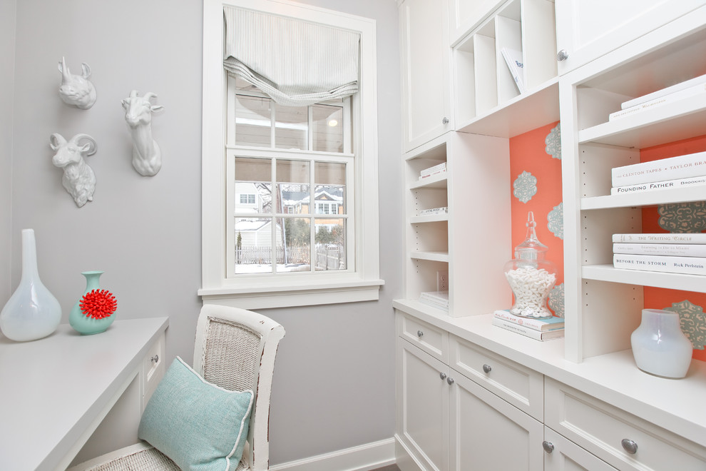 Example of a trendy home office design in Minneapolis with gray walls