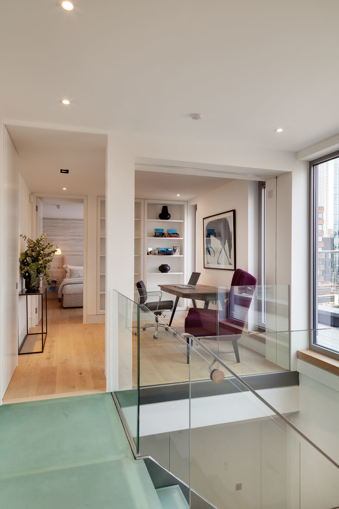 Medium sized modern home office in London.