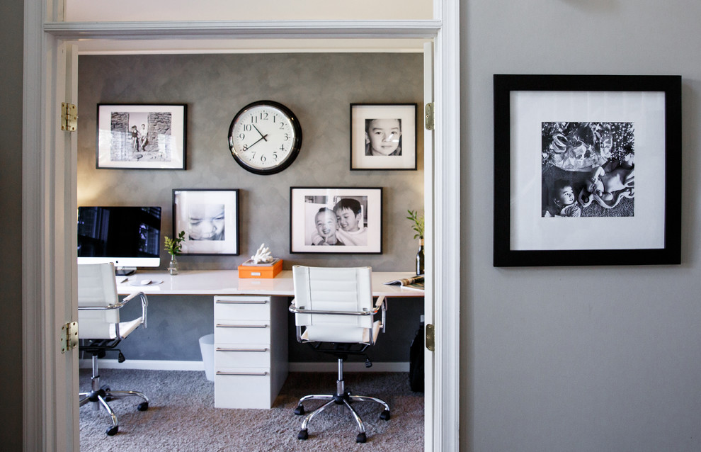 Inspiration for a small modern study in DC Metro with grey walls and a freestanding desk.