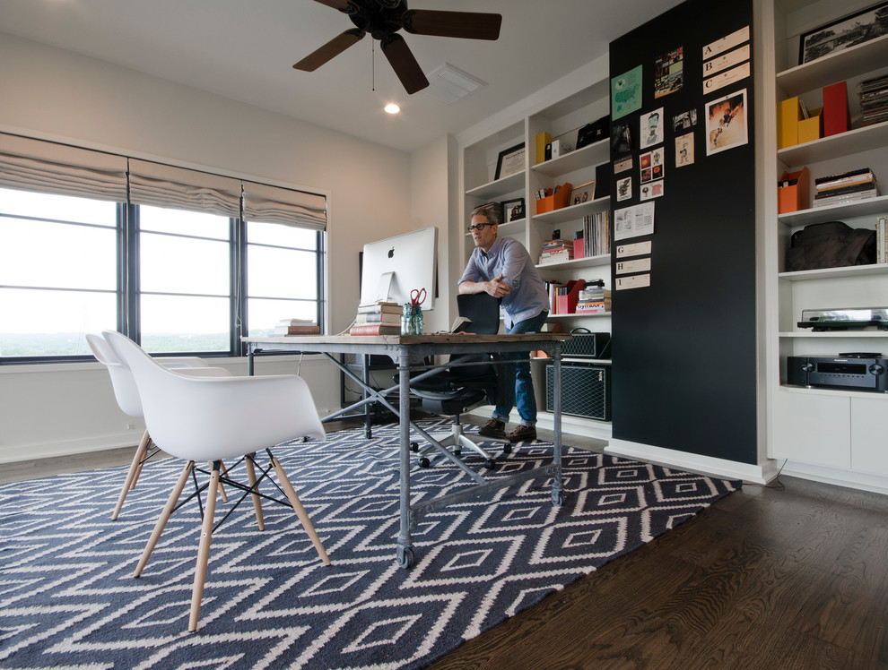 Inspiration for a contemporary home office in Austin with white walls.