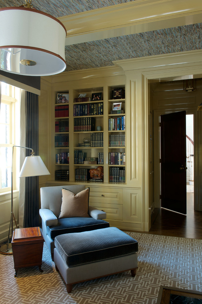 Example of a classic freestanding desk home office library design in Dallas