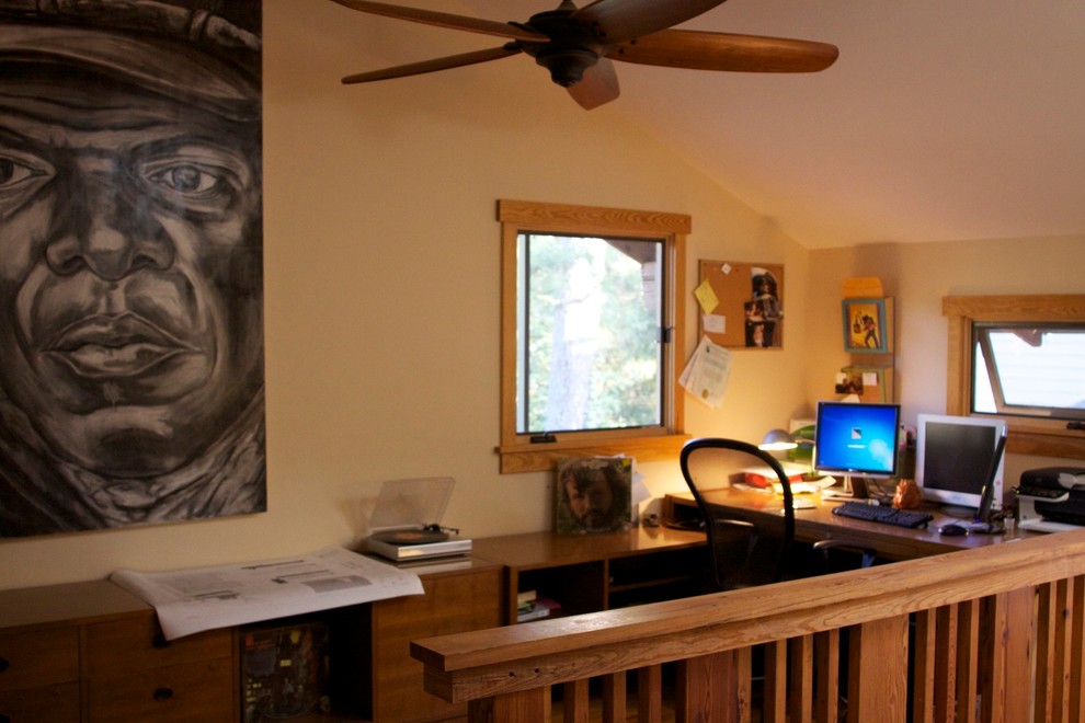 Inspiration for a small craftsman built-in desk study room remodel in Atlanta with beige walls and no fireplace
