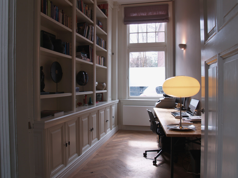 Inspiration for a contemporary home office remodel in Amsterdam