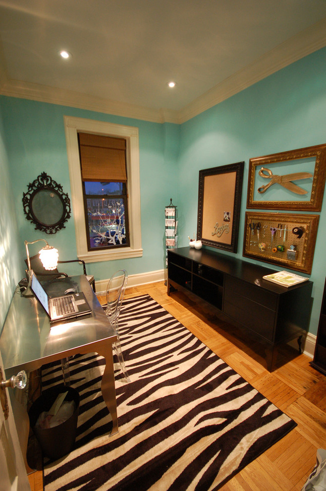 Example of an eclectic home office design in New York