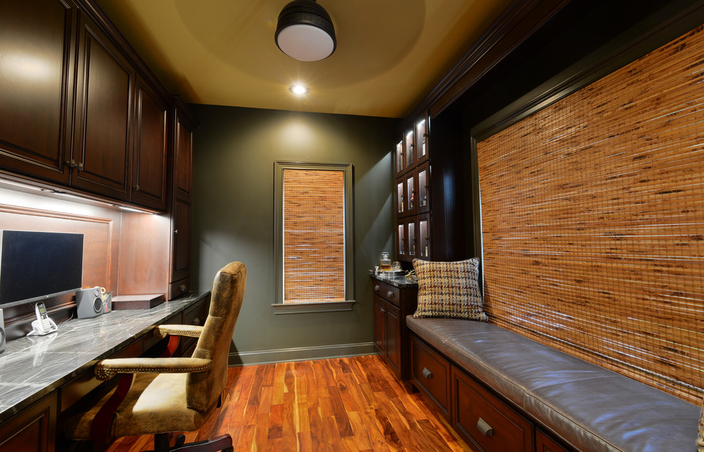 Inspiration for a medium tone wood floor and brown floor home office remodel in Philadelphia