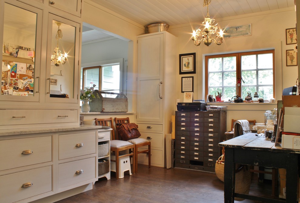 Example of a cottage home office design in Seattle