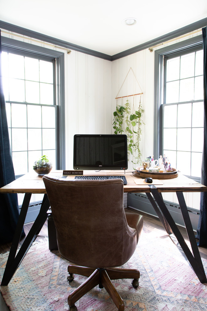Example of a transitional home office design in Chicago