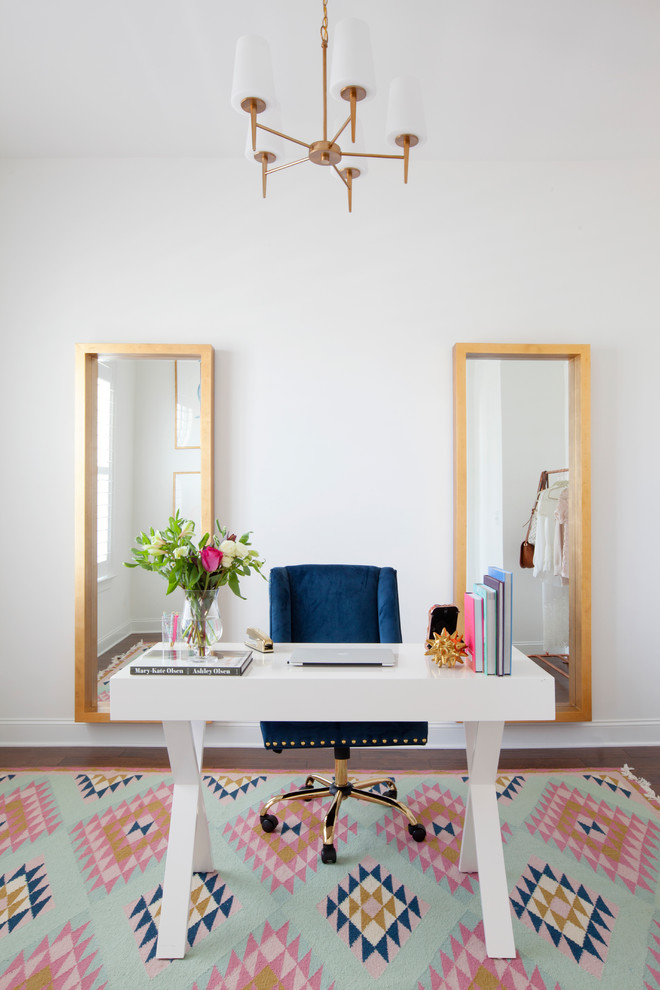 Elegant freestanding desk study room photo in Charleston with white walls
