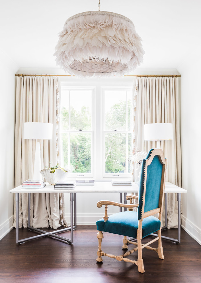 Example of a transitional freestanding desk dark wood floor study room design in Nashville with white walls and no fireplace