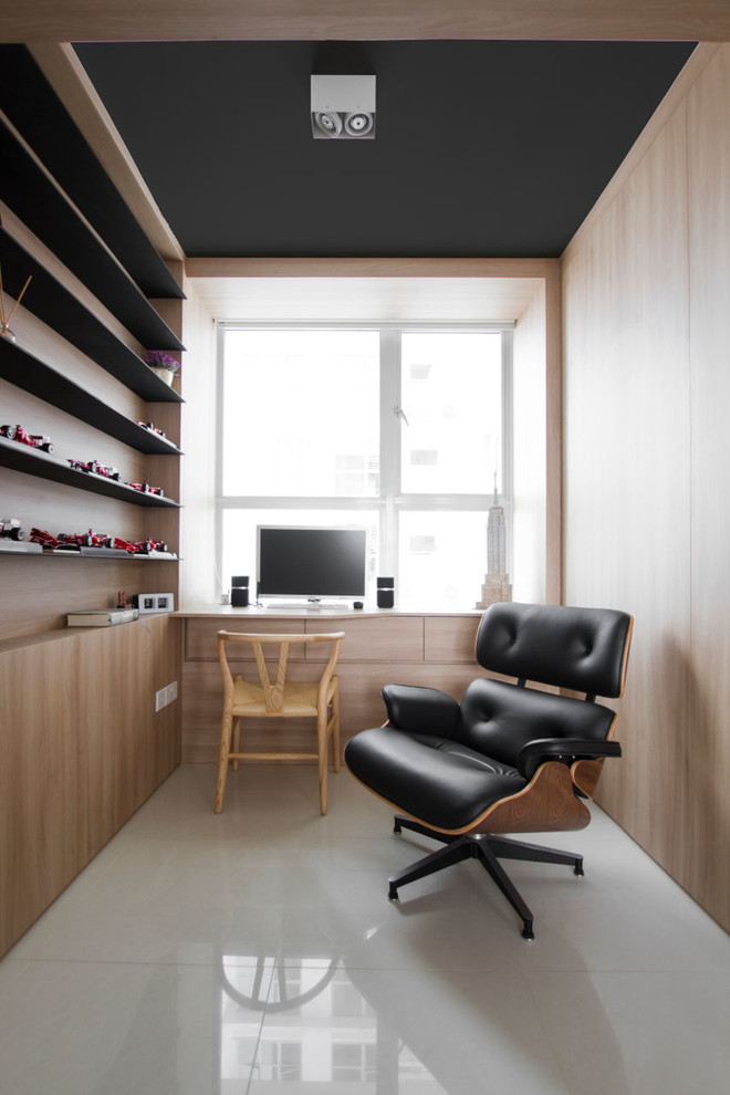 Inspiration for a contemporary home office in Singapore.