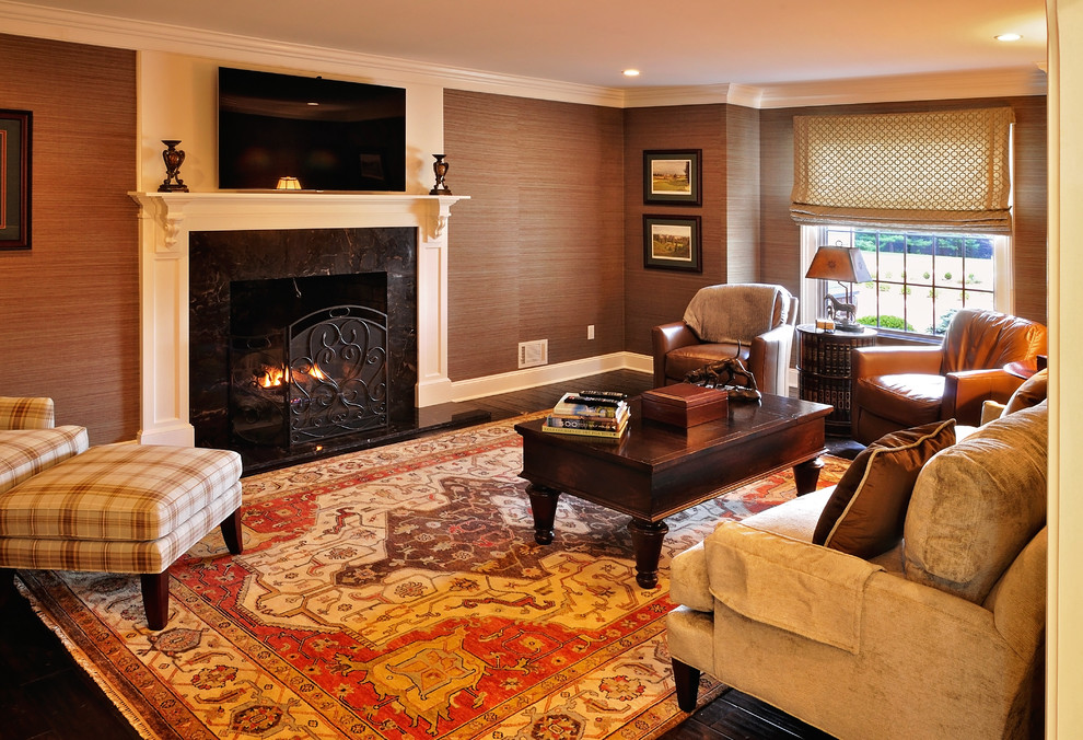 Design ideas for a medium sized traditional study in New York with brown walls, dark hardwood flooring, a standard fireplace and a stone fireplace surround.