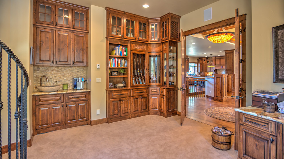 Large classic study in Denver with beige walls, carpet, no fireplace and a built-in desk.