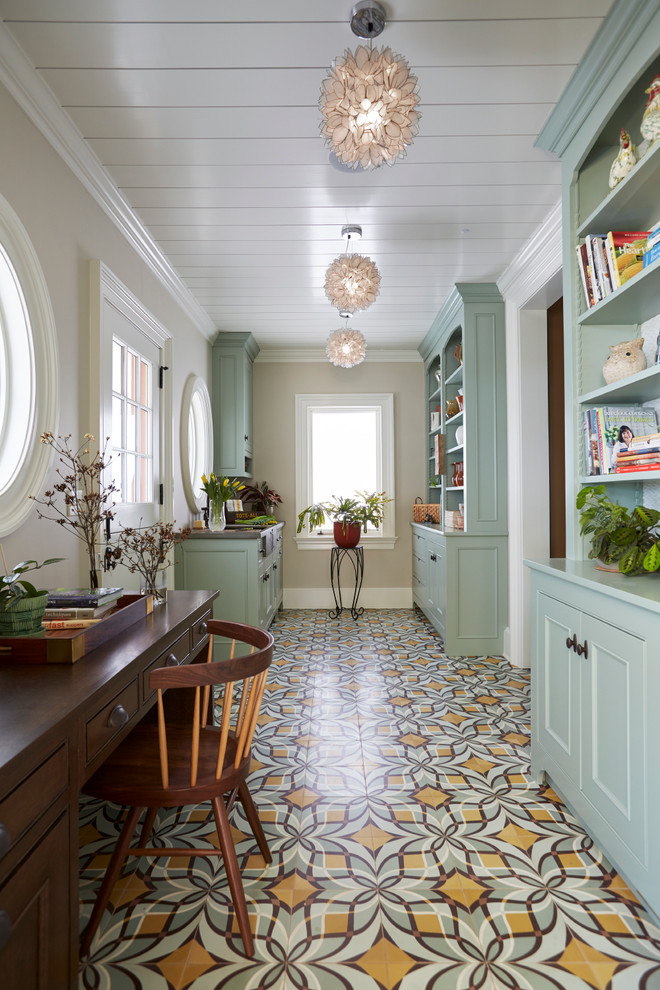 Study room - large farmhouse freestanding desk multicolored floor and concrete floor study room idea in New York with beige walls and no fireplace