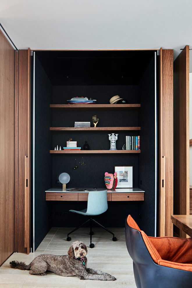 Home office - large mid-century modern home office idea in Melbourne