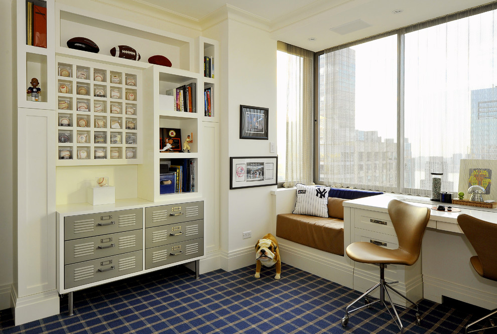 This is an example of a medium sized contemporary study in New York with white walls, carpet, a built-in desk and no fireplace.