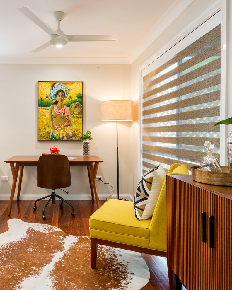 Inspiration for a mid-sized 1960s freestanding desk dark wood floor study room remodel in Brisbane