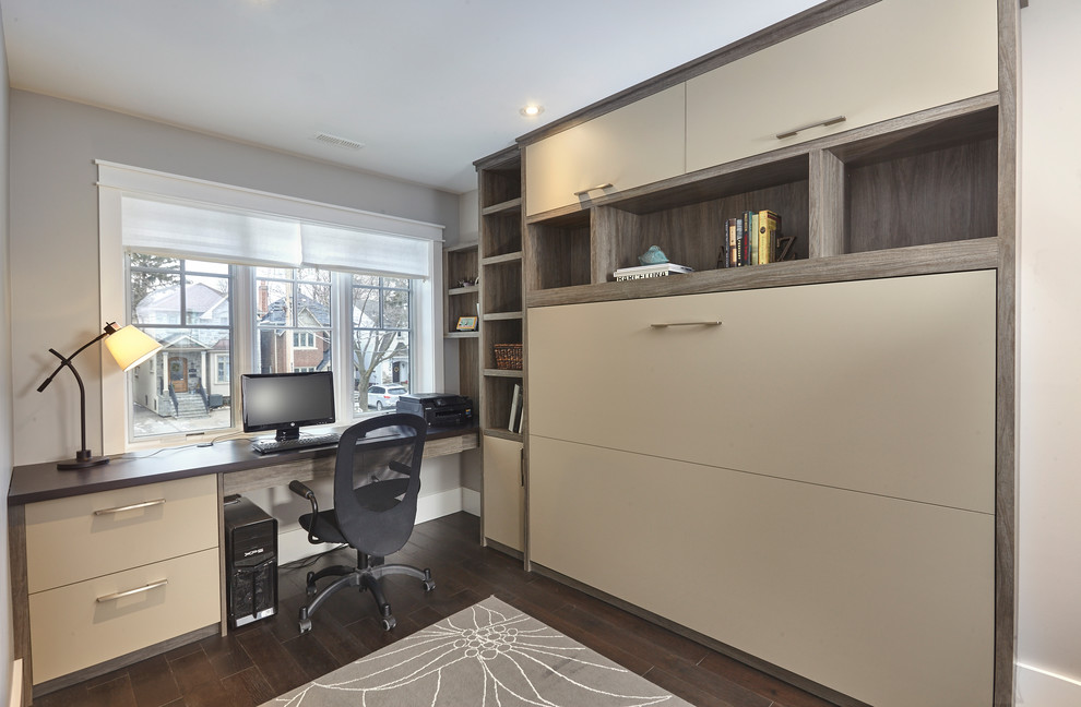 Inspiration for a modern built-in desk home office remodel in Toronto