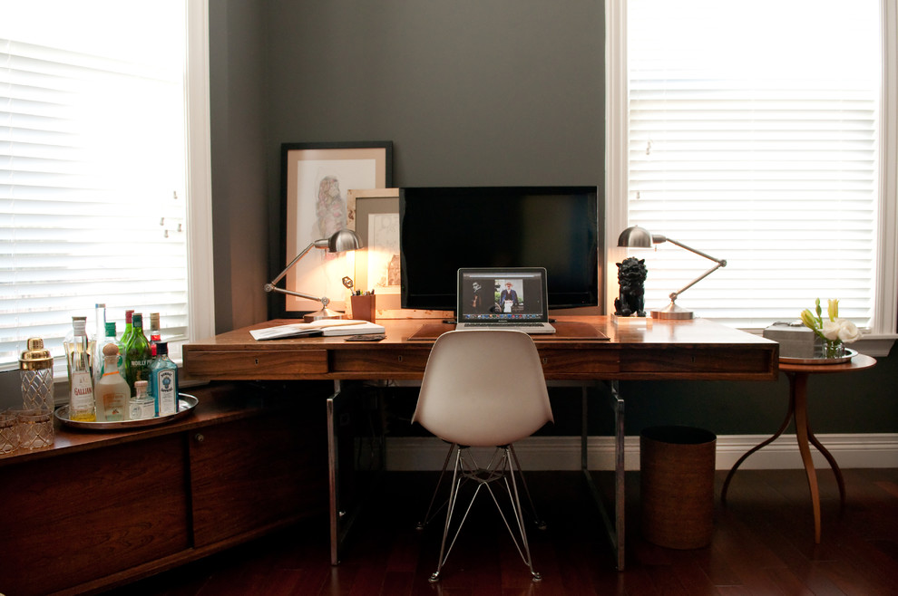 Small contemporary home office in San Francisco with grey walls, dark hardwood flooring and a freestanding desk.