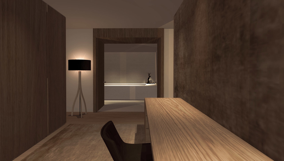 Inspiration pour un petit bureau minimaliste de type studio avec un sol en bois brun, un bureau intégré et un sol beige.