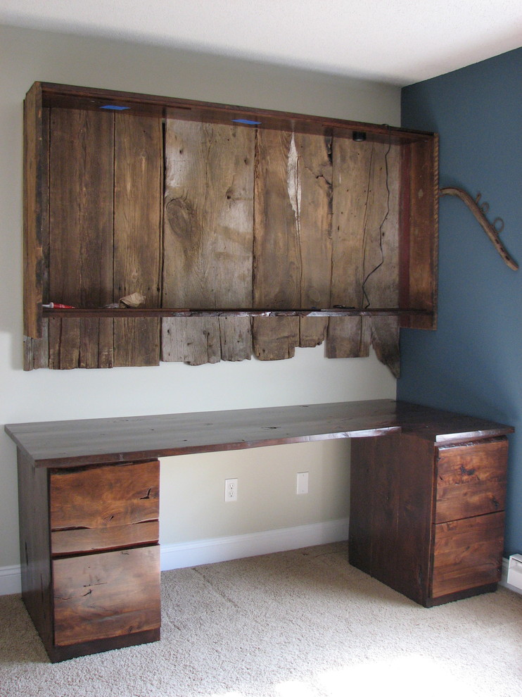 This is an example of a rustic home office in Other.