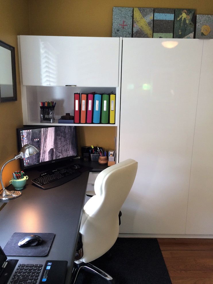 Photo of a medium sized contemporary study in Toronto with a built-in desk.