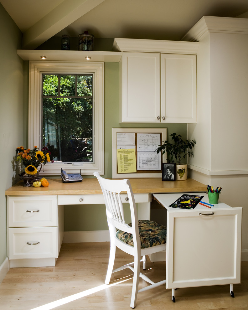 Elegant built-in desk home office photo in San Francisco