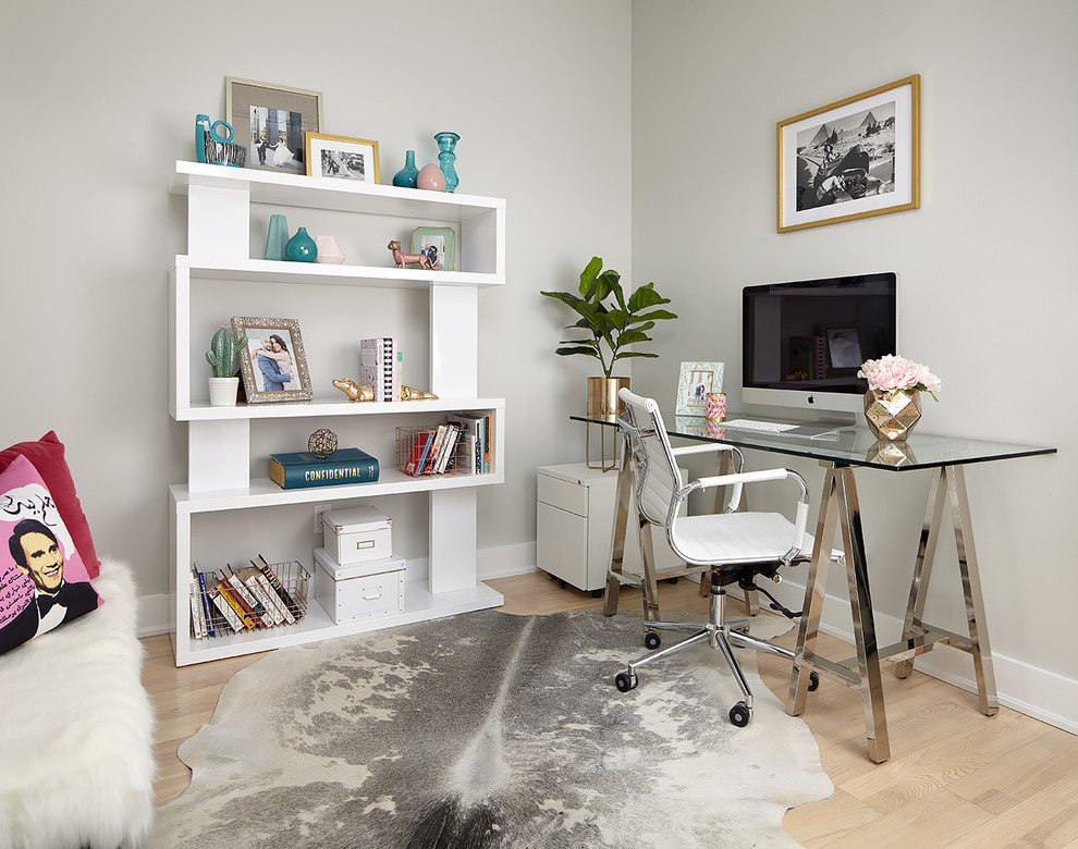 Transitional freestanding desk light wood floor and beige floor study room photo in Toronto with gray walls