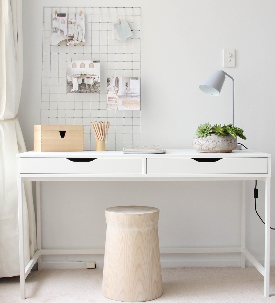Inspiration for a small scandinavian freestanding desk carpeted study room remodel in Sydney with white walls