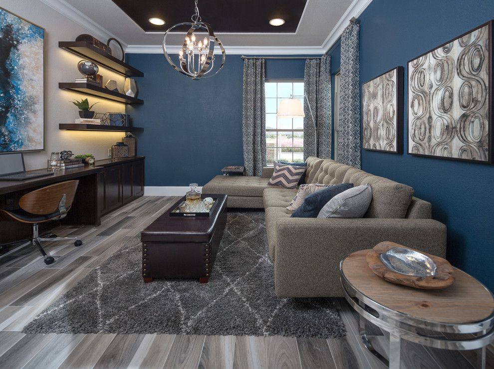 Esempio di un grande ufficio minimal con pareti blu, pavimento con piastrelle in ceramica, nessun camino e scrivania incassata