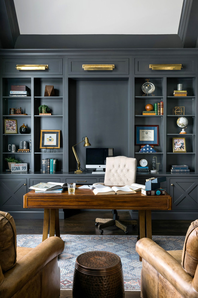 Large transitional freestanding desk dark wood floor and brown floor study room photo in Atlanta with gray walls