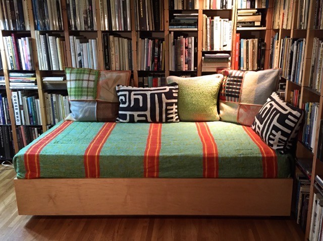 Photo of a small bohemian home office in Los Angeles with a reading nook and light hardwood flooring.