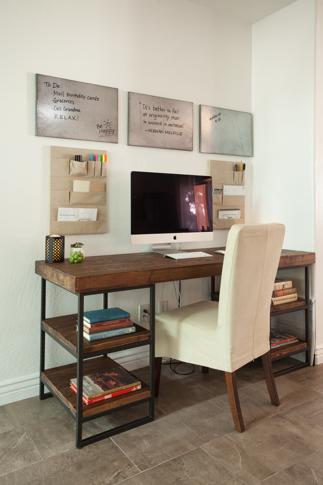 Example of a small transitional freestanding desk porcelain tile home office design in Phoenix with white walls