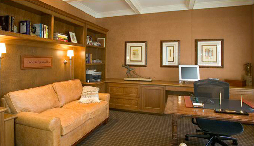 Inspiration for a mid-sized transitional freestanding desk study room remodel in New York with brown walls