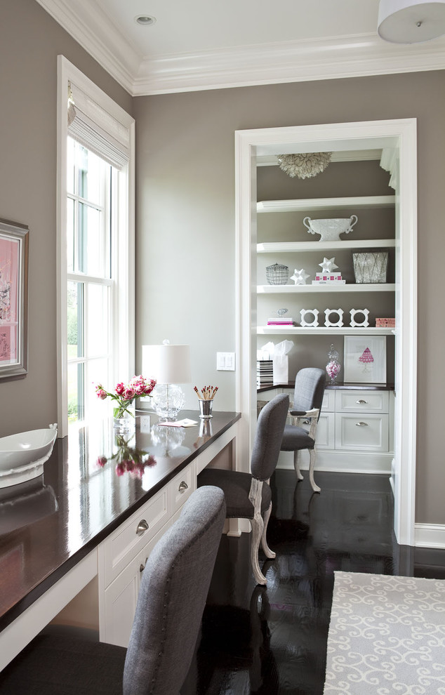 Home office - mid-sized traditional built-in desk painted wood floor home office idea in Minneapolis with no fireplace and gray walls