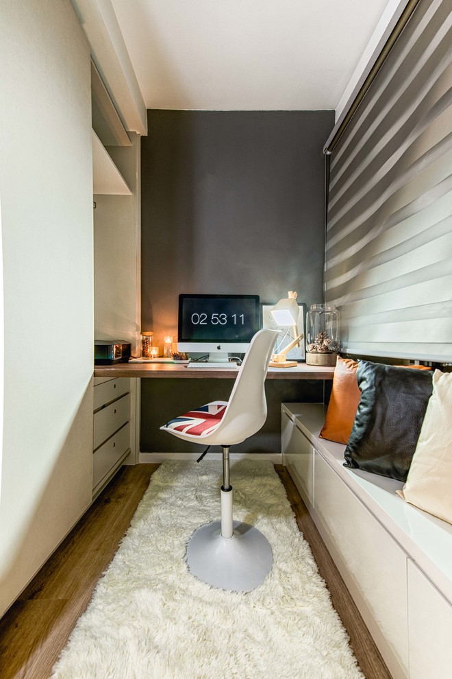 This is an example of a small scandinavian home office in Singapore.