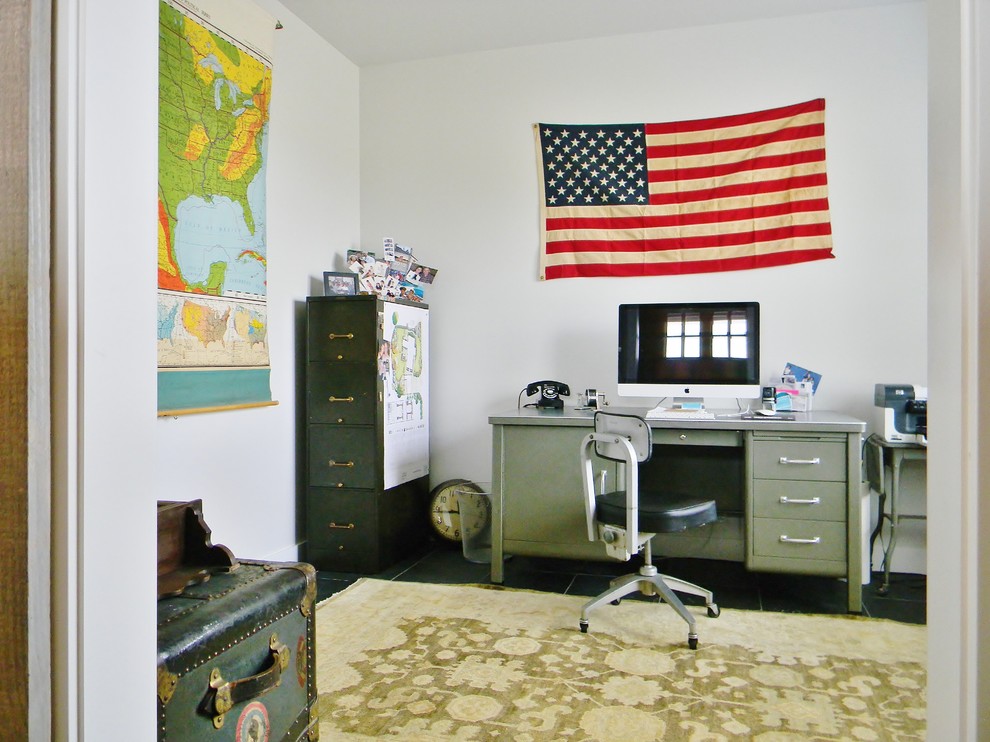 Inspiration for a cottage freestanding desk home office remodel in Seattle with white walls