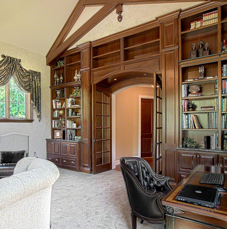 Photo of a large traditional home office in Dallas with carpet, a standard fireplace, a stone fireplace surround, a freestanding desk and white floors.