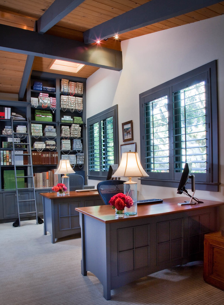 Design ideas for a traditional home office in San Diego with white walls.