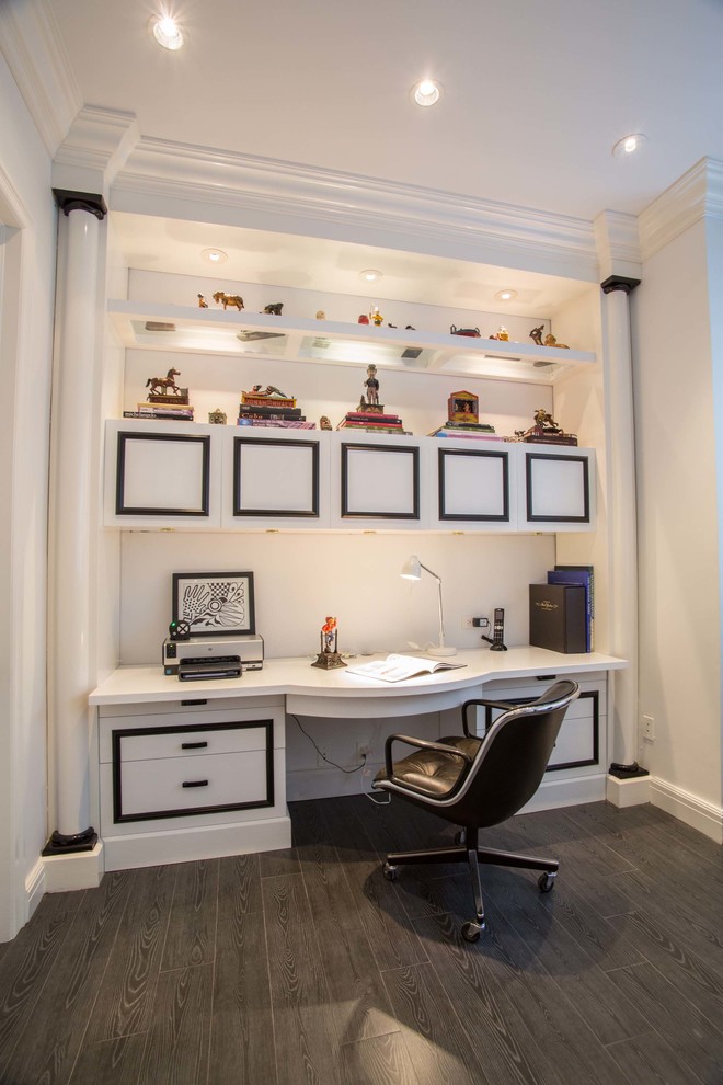 Photo of a contemporary home office in Miami with a built-in desk.