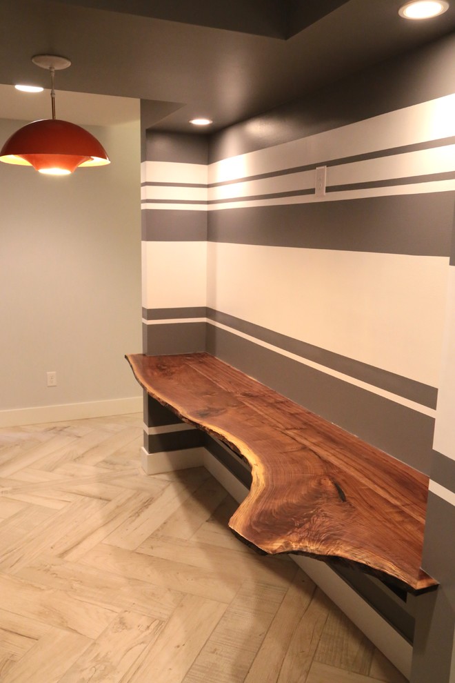 Inspiration for a modern light wood floor home office remodel in Kansas City with multicolored walls