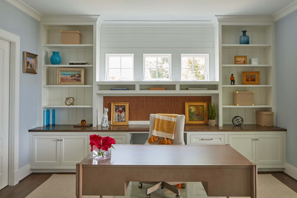 Inspiration for a large coastal freestanding desk medium tone wood floor and brown floor study room remodel in Baltimore