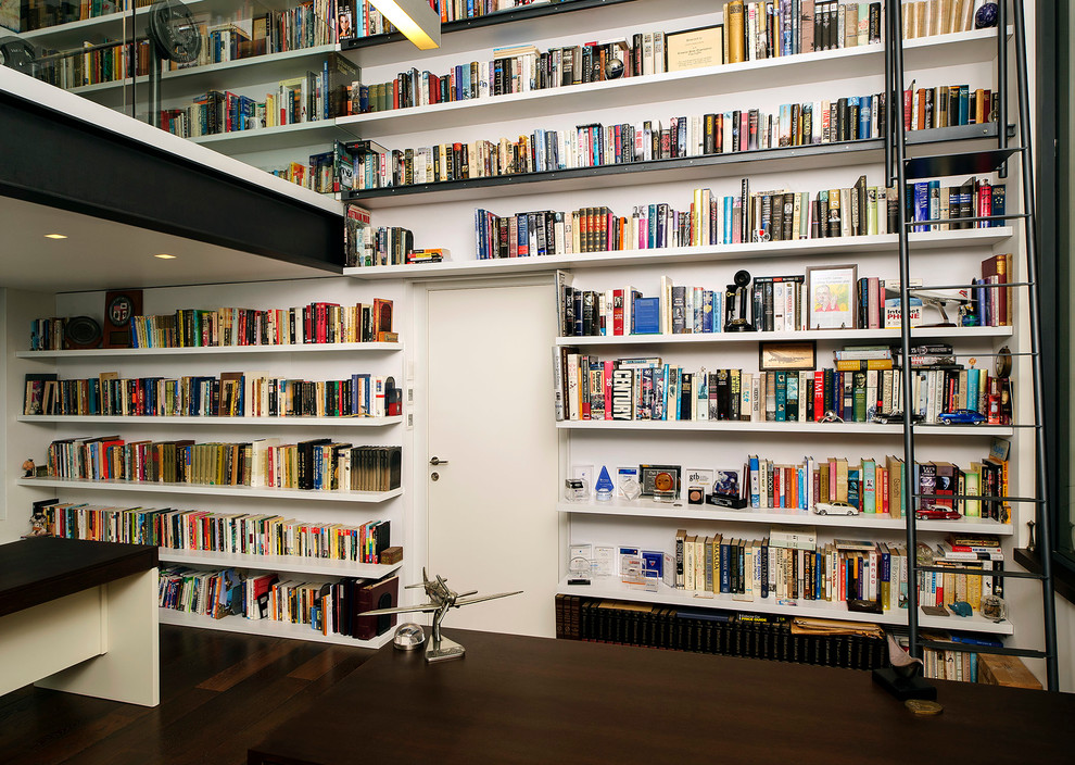 Home office - modern dark wood floor home office idea in Tel Aviv with white walls
