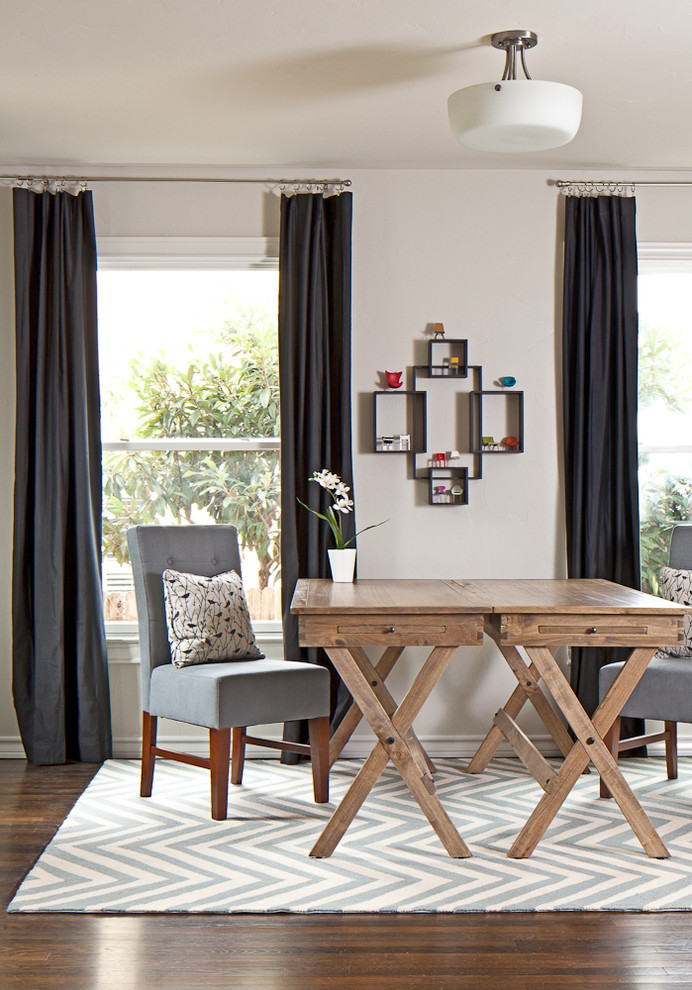 Inspiration for a transitional home office remodel in Austin with white walls