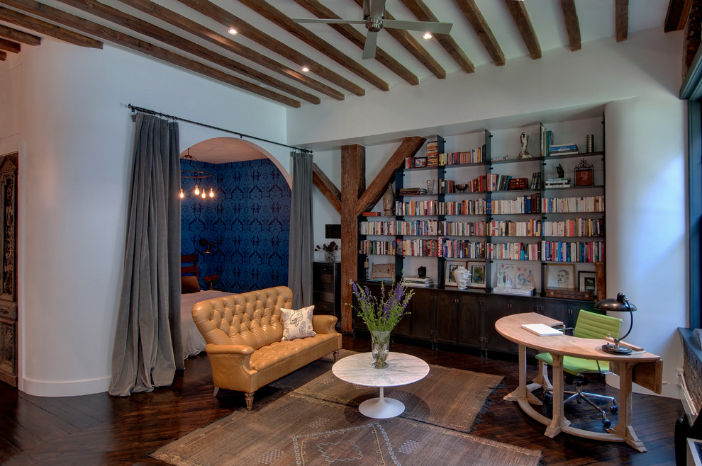 Inspiration for an industrial freestanding desk dark wood floor home office remodel in New York with white walls