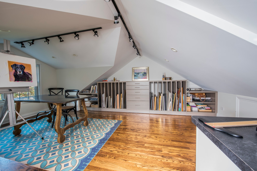 Mid-sized eclectic freestanding desk medium tone wood floor home studio photo in Chicago with white walls and no fireplace