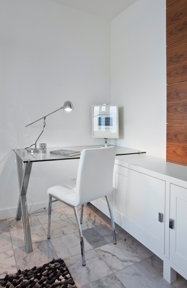 Contemporary home office in Vancouver with white walls.