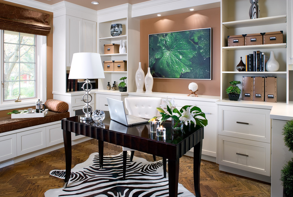 Inspiration for a large contemporary freestanding desk dark wood floor and brown floor home office remodel in Toronto with brown walls and no fireplace