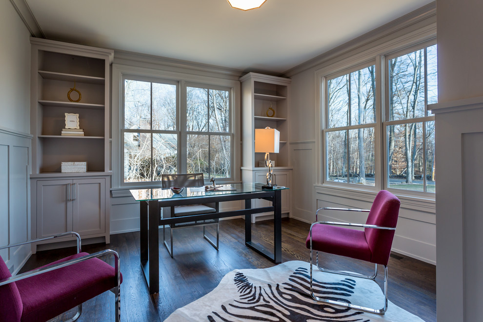 Example of a transitional home office design in New York