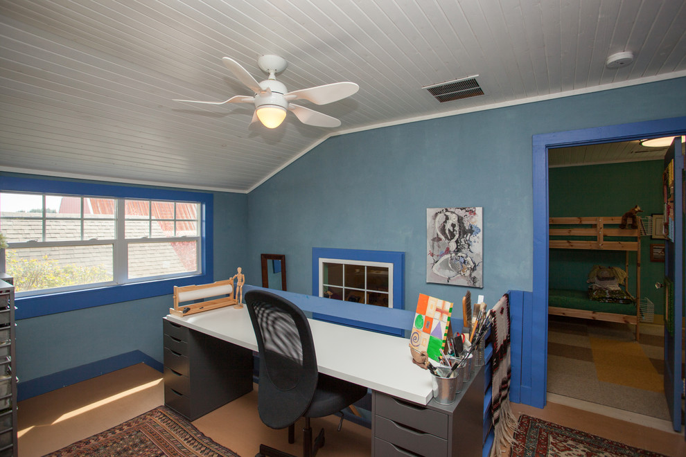 Example of a small eclectic freestanding desk painted wood floor and beige floor craft room design in Portland with blue walls and no fireplace